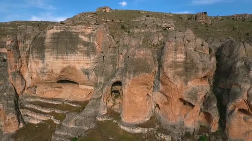 Caves and Layered Rock Cliffs Aerial
