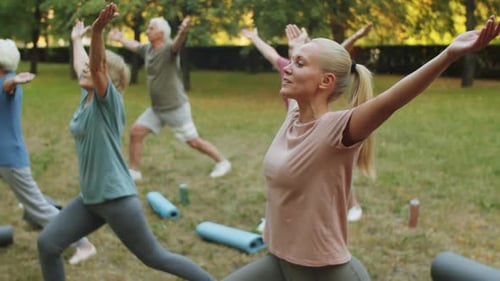 Yoga Class in Park with Active Adults and Seniors