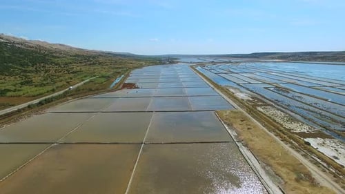 Flying above salt evaporation ponds on Pag island, Croatia