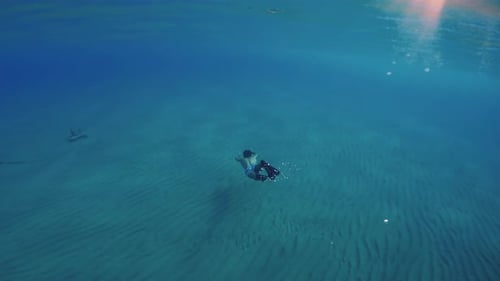 Diving Underwater the Sea With Long Fins