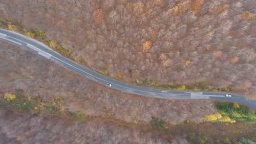Car Passing Mountain Road, Drone Follows Slow Driving Car