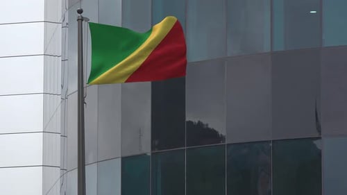 Republic of Congo National Flag Waving on Corporate Building