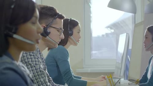 Helpdesk Workers Talking with Clients