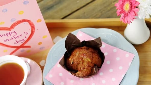 Close Up of Muffin Tea and Mother's Day Card