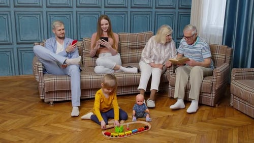 Family Relaxing Together in Living Room