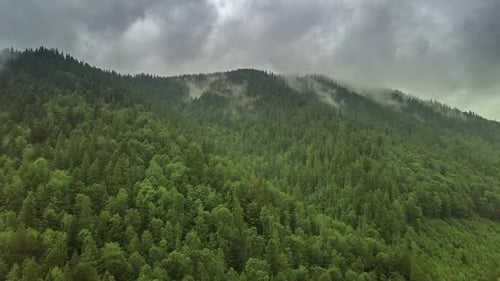 Mountain Peaks and Morning Sky with Smooth Moving Clouds