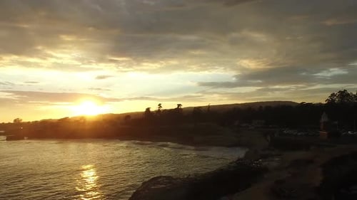 Coastal Beach at Golden Hour Aerial View