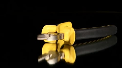 Close Up of Wire Cutters Tool on Black