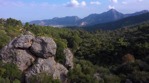 Aerial Panoramic View of Green Mountains on a Cloudy Day