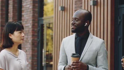 Diverse Business People Talking on Street