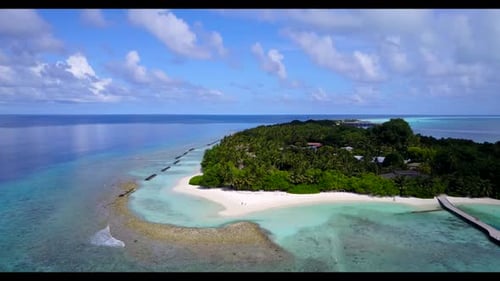 Aerial landscape of idyllic shore beach journey by transparent sea with white sandy background of a