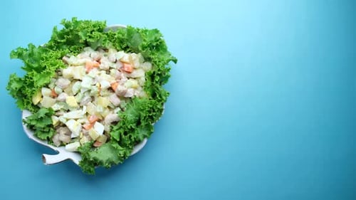 Overhead Shot of Fresh Salad on Light Blue