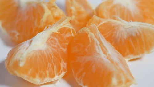 Tangerine Slices on a Rotating Table