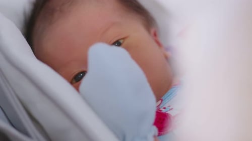 Close Up of a Beautiful Newborn Infant