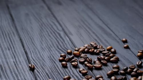 Coffee Beans Spilling From a Burlap Sack
