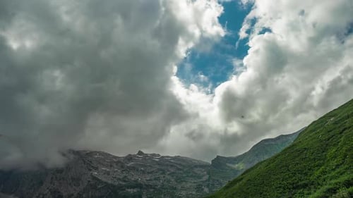 Day Timelapse Shooting of Stunning Huge Clouds Soaring in the Sky Like Thick Smoke Over the