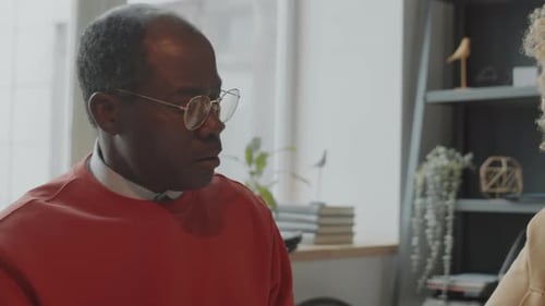 Multiethnic Business People Having Discussion in Office