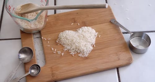 Heart Shape Made of Rice on Cutting Board