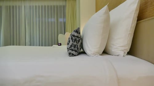 Inviting Bed in Hotel Room, Pristine and Cozy