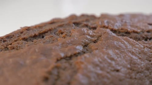 Tasty chocolate cake texture slow panning 4K 2160p UltraHD footage - Chocolate cake surface cracked