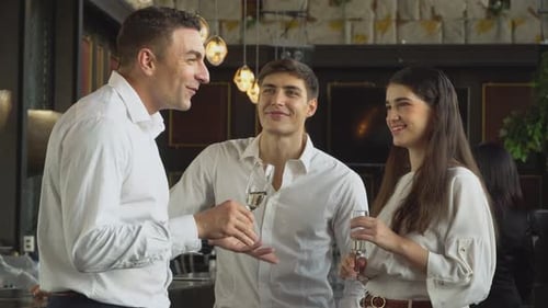 Adults Networking with Champagne at Modern Urban Bar