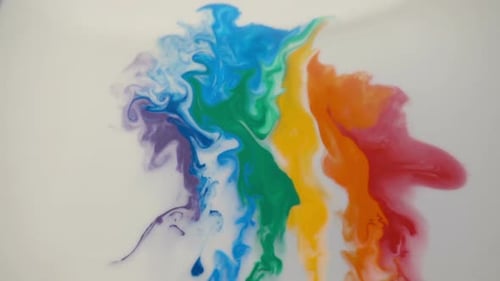 Colorful Paint Dissolving in Water Abstract Background