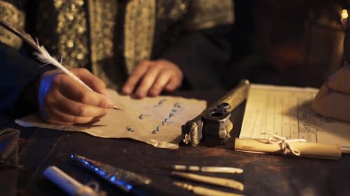 Writing With a Quill Pen and Ink