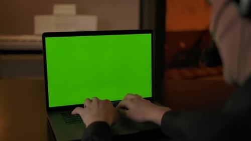 Unrecognzable Call Centre Support Employee with Chromakeyed Display