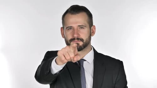 Man in Suit Points Directly At Camera