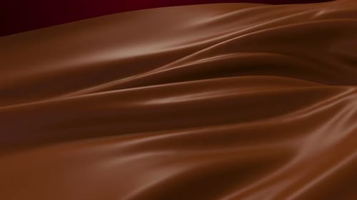 Loop-Animation der seidigen Schokolade, die im Wind weht.