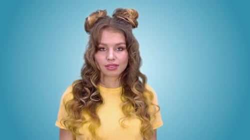 Young Woman Surprised with Hands Up