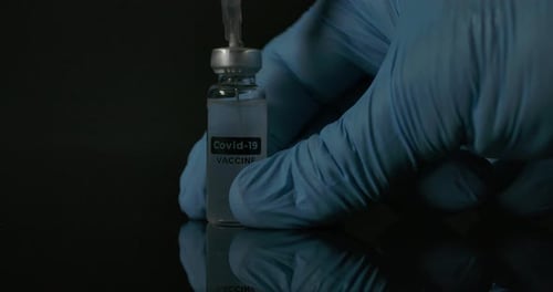 Vaccine Being Drawn into Syringe in Lab