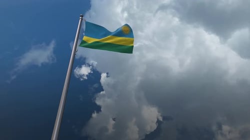 Realistic 3D Rwanda Flag Waving Against Dynamic Clouds