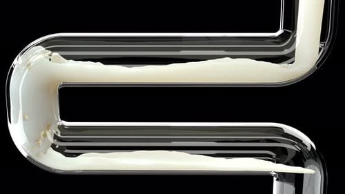 White Liquid Flowing Through Transparent Winding Pipe