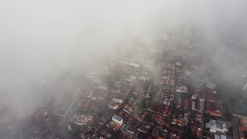 Aerial view Unesco heritage house covered by low cloud