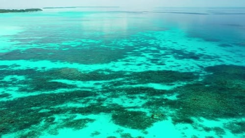 Aerial drone shot panorama of paradise tourist beach lifestyle by transparent ocean and white sand b