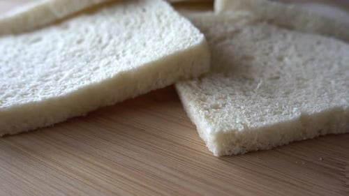 Close Up of Sliced White Bread on Board