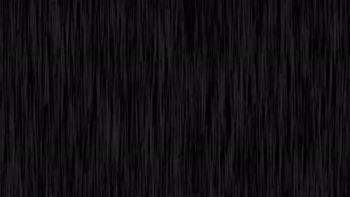 Falling raindrops footage on dark black background