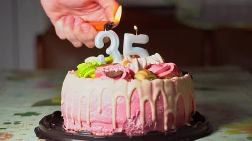 Birthday Cake with Lit Candles Celebrating Thirty-Five Years