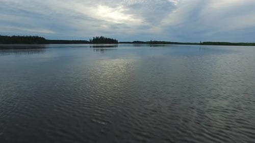 Cloudy sky reflecting on a lake