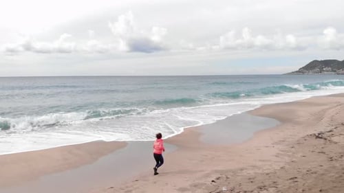 Running on sandy beach