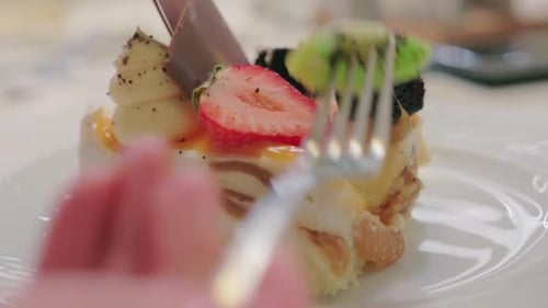 Fork Cutting Into Delicious Dessert Cake