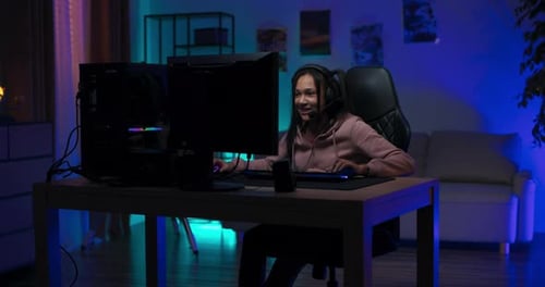 Enthusiastic Woman Playing Video Game at Home