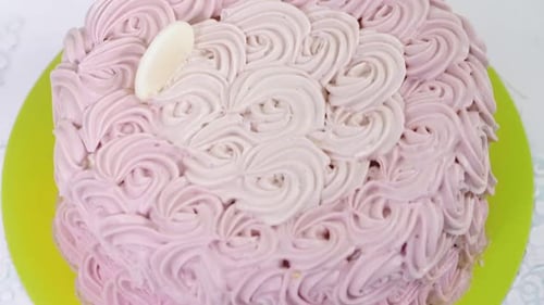 Pink Swirl Frosted Birthday Cake