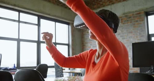 Executive using virtual reality headset in office 4k