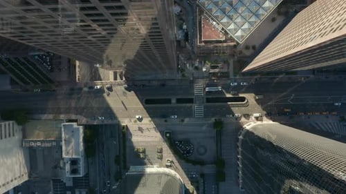 AERIAL: Slow Lowering Birds Eye View Flight Over Downtown Los Angeles California Grand Avenue in