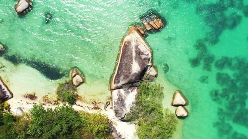 Aerial top down texture of relaxing shore beach vacation by blue water with white sandy background o
