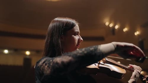 Talented Female Violinist is Playing Violin in Philharmonic Hall Female Musician in Symphonic