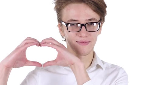 Young Man Makes Heart Shape with Hands
