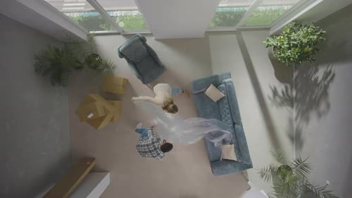 Couple Relaxing After Moving Into New Home